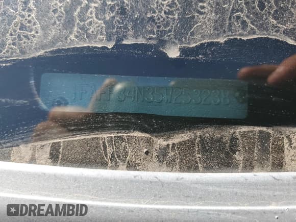 ✅ 2005 Ford Focus S • VIN: 1FAFP34N35W253238 • Lot: 91303485. Listed on Copart with 277,357 mi. Free auction sales archive from the USA and detailed vehicle history report at DreamBid. Image 12.