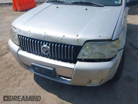 2006 Mercury Mariner Luxury с VIN 4M2CU57106DJ03167, выставлен на аукционе IAAI как лот 42600111 с пробегом 273 239 миль миль и . История ставок и продаж доступна на DreamBid. Изображение 6.