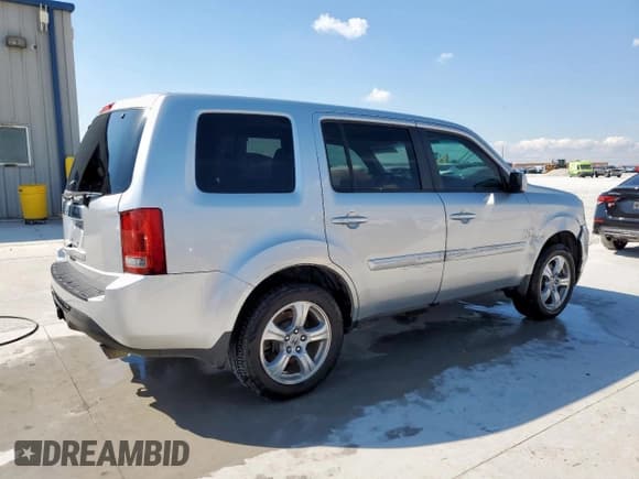 ✅ 2014 Honda Pilot EX-L • VIN: 5FNYF3H74EB006459 • Lot: 84260255. Listed on Copart with 222,081 mi. Free auction sales archive from the USA and detailed vehicle history report at DreamBid. Image 3.