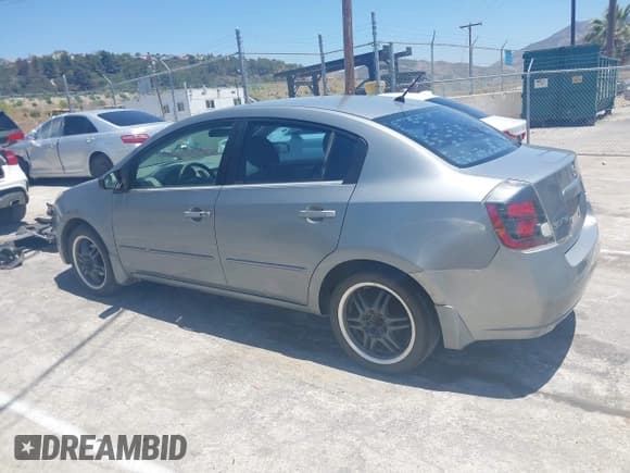 ✅ 2007 Nissan Sentra 2.0 • VIN: 3N1AB61E27L682486 • Lot: 42304267. Listed on IAAI with 201,676 mi. Free auction sales archive from the USA and detailed vehicle history report at DreamBid. Image 14.