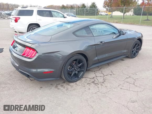 ✅ 2018 Ford Mustang EcoBoost • VIN: 1FA6P8TH0J5103113 • Lot: 43645805. Listed on IAAI with 52,797 mi. Free auction sales archive from the USA and detailed vehicle history report at DreamBid. Image 4.