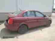 2006 Hyundai Accent GL z VIN KMHCN45C26U052459, wystawiony jako Copart lot #60089355 z przebiegiem 247 311 mil mil oraz Szkoda całkowita • Salvage title. Historia ofert i sprzedaży dostępna na DreamBid. Obrazek 3.