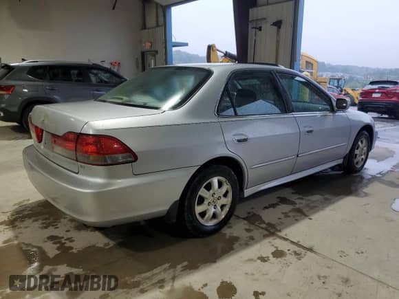 2001 Honda Accord EX с VIN 1HGCG56621A018370, выставлен на аукционе Copart как лот 81444985 с пробегом 113 403 миль миль и Списание • Salvage title. История ставок и продаж доступна на DreamBid. Изображение 3.