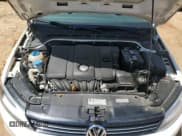 ✅ 2013 Volkswagen Jetta SE • VIN: 3VWDX7AJ0DM221837 • Lot: 52502565. Listed on Copart with 148,730 mi. Free auction sales archive from the USA and detailed vehicle history report at DreamBid. Image 13.