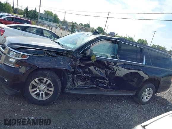 ✅ 2015 Chevrolet Suburban LT • VIN: 1GNSKJKC5FR688637 • Lot: 43232837. Listed on IAAI with 267,129 mi. Free auction sales archive from the USA and detailed vehicle history report at DreamBid. Image 14.