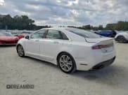 ✅ 2016 Lincoln MKZ • VIN: 3LN6L2J90GR630133 • Lot: 94142215. Wystawiony na Copart z przebiegiem 69 572 mil. Bezpłatny archiwum sprzedaży aukcyjnych z USA i szczegółowy raport historii pojazdu na DreamBid. Zdjęcie 2.