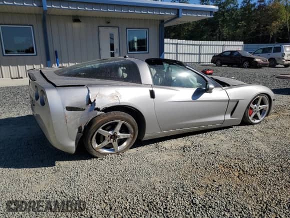 2005 Chevrolet Corvette with VIN 1G1YY24U055111302, listed as a Copart auction lot 76705084 with Not provided miles and Salvage title. Bid and sale history available at DreamBid. Image 3.