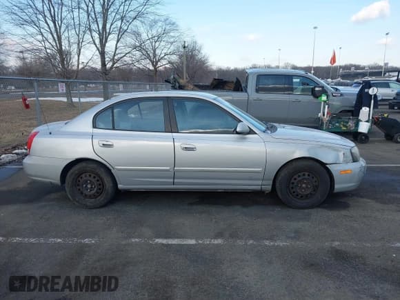 ✅ 2003 Hyundai Elantra GLS • VIN: KMHDN45D93U701294 • Lot: 41357640. Wystawiony na IAAI z przebiegiem 248 029 mil. Bezpłatny archiwum sprzedaży aukcyjnych z USA i szczegółowy raport historii pojazdu na DreamBid. Zdjęcie 13.