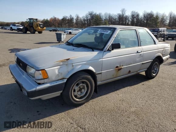 ✅ 1990 Nissan Sentra • VIN: 1N4GB22B7LC773110 • Лот: 55384855. Опубликован ранее на Copart с пробегом 48 159 миль. Бесплатный доступ к архиву аукционных продаж из США и подробный отчёт об истории автомобиля на DreamBid. Изображение 1.