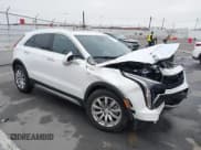 ✅ 2022 Cadillac XT4 FWD Premium Luxury • VIN: 1GYFZCR49NF100393 • Lot: 42497187. Listed on IAAI with 23,672 mi. Free auction sales archive from the USA and detailed vehicle history report at DreamBid. Image 1.