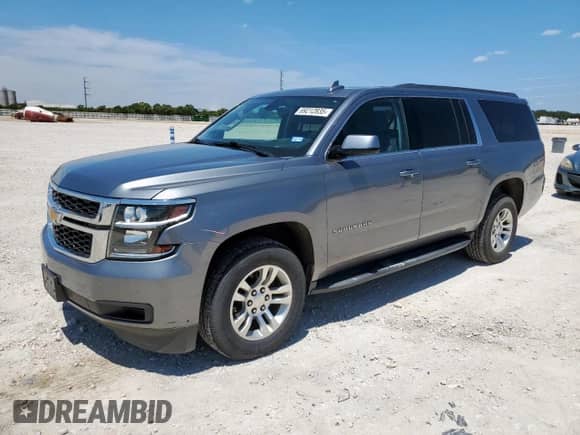 2020 Chevrolet Suburban LS z VIN 1GNSCGKC5LR282191, wystawiony jako Copart lot #69212835 z przebiegiem 127 042 mil mil oraz Szkoda całkowita • Salvage title. Historia ofert i sprzedaży dostępna na DreamBid. Obrazek 1.