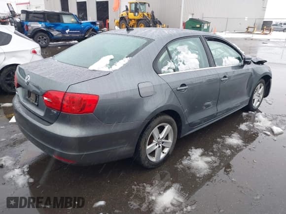 ✅ 2014 Volkswagen Jetta TDI w/Premium/Nav • VIN: 3VWLL7AJ4EM332920 • Lot: 41630948. Listed on IAAI with 148,754 mi. Free auction sales archive from the USA and detailed vehicle history report at DreamBid. Image 4.