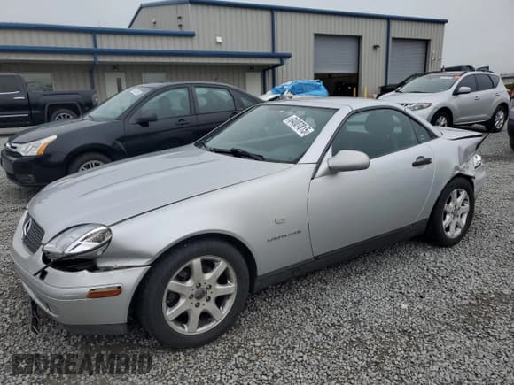 ✅ 2000 Mercedes-Benz SLK 230 Kompressor • VIN: WDBKK47F3YF157811 • Лот: 64007815. Опубликован ранее на Copart с пробегом 102 630 миль. Бесплатный доступ к архиву аукционных продаж из США и подробный отчёт об истории автомобиля на DreamBid. Изображение 1.