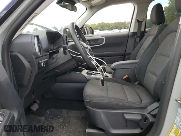 ✅ 2024 Ford Bronco Sport Big Bend • VIN: 3FMCR9B67RRE30318 • Лот: 71085175. Опубликован ранее на Copart с пробегом 22 811 миль. Бесплатный доступ к архиву аукционных продаж из США и подробный отчёт об истории автомобиля на DreamBid. Изображение 7.