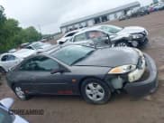 ✅ 2002 Mercury Cougar • VIN: 1ZWFT61L925618994 • Lot: 42509179. Listed on IAAI with 159,093 mi. Free auction sales archive from the USA and detailed vehicle history report at DreamBid. Image 13.