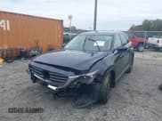 ✅ 2021 Mazda CX-9 Touring • VIN: JM3TCBCYXM0521709 • Lot: 43452547. Listed on IAAI with 50,115 mi. Free auction sales archive from the USA and detailed vehicle history report at DreamBid. Image 2.