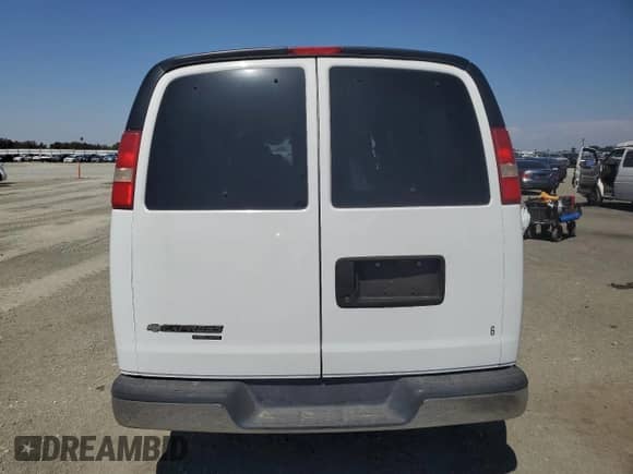 2014 Chevrolet Express Passenger 1LT with VIN 1GNSGCF43E1130315, listed as a Copart auction lot 69969665 with 148,721 mi miles and Salvage title. Bid and sale history available at DreamBid. Image 6.