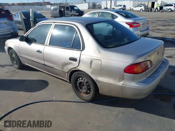✅ 1999 Toyota Corolla VE • VIN: 2T1BR12EXXC185672 • Lot: 43506844. Listed on IAAI with 320,986 mi. Free auction sales archive from the USA and detailed vehicle history report at DreamBid. Image 3.