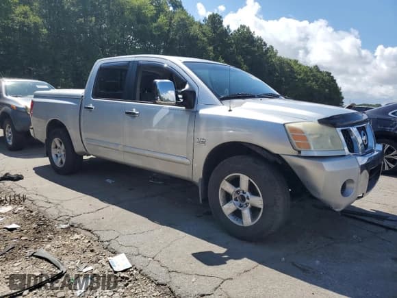 ✅ 2004 Nissan Titan LE • VIN: 1N6AA07A34N546992 • Lot: 65247535. Listed on Copart with 194,720 mi. Free auction sales archive from the USA and detailed vehicle history report at DreamBid. Image 4.