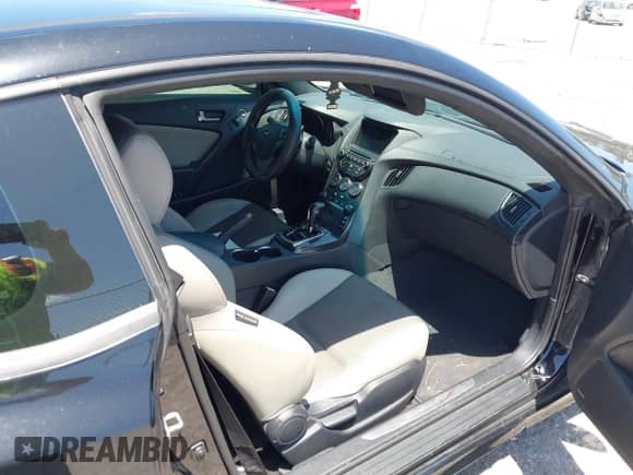 2014 Hyundai Genesis Coupe R-Spec with VIN KMHHT6KD8EU120606, listed as a IAAI auction lot 42166787 with 90,910 mi miles and . Bid and sale history available at DreamBid. Image 5.