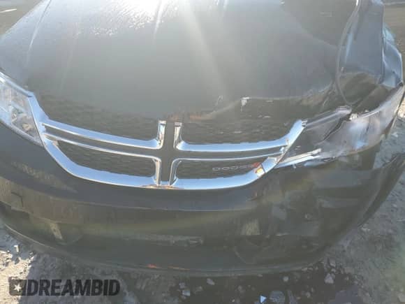 2018 Dodge Journey SE with VIN 3C4PDCAB0JT427879, listed as a Copart auction lot 82583695 with 80,549 mi miles and Salvage title. Bid and sale history available at DreamBid. Image 12.