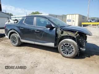 2024 Hyundai Santa Cruz SEL z VIN 5NTJCDAEXRH086304, wystawiony jako Copart lot #71796694 z przebiegiem 6 944 mil mil oraz Szkoda całkowita • Salvage title. Historia ofert i sprzedaży dostępna na DreamBid. Obrazek 4.