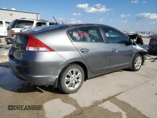✅ 2010 Honda Insight EX • VIN: JHMZE2H78AS041986 • Лот: 71235274. Опубликован ранее на Copart с пробегом 199 688 миль. Бесплатный доступ к архиву аукционных продаж из США и подробный отчёт об истории автомобиля на DreamBid. Изображение 3.