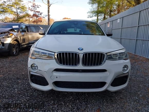 ✅ 2016 BMW X4 M40i • VIN: 5UXXW7C55G0M91316 • Lot: 43771718. Listed on IAAI with 132,706 mi. Free auction sales archive from the USA and detailed vehicle history report at DreamBid. Image 12.