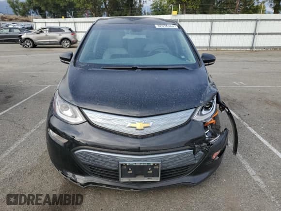 ✅ 2018 Chevrolet Bolt EV LT • VIN: 1G1FW6S03J4136795 • Lot: 82376364. Wystawiony na Copart z przebiegiem 51 828 mil. Bezpłatny archiwum sprzedaży aukcyjnych z USA i szczegółowy raport historii pojazdu na DreamBid. Zdjęcie 5.