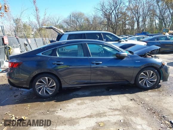 ✅ 2022 Honda Insight Touring • VIN: 19XZE4F95NE004016 • Lot: 43641102. Listed on IAAI with 50,901 mi. Free auction sales archive from the USA and detailed vehicle history report at DreamBid. Image 13.