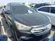 2017 Hyundai Santa Fe 2.4L z VIN 5NMZU3LBXHH012582, wystawiony jako IAAI lot #43513858 z przebiegiem 139 498 mil mil oraz . Historia ofert i sprzedaży dostępna na DreamBid. Obrazek 1.