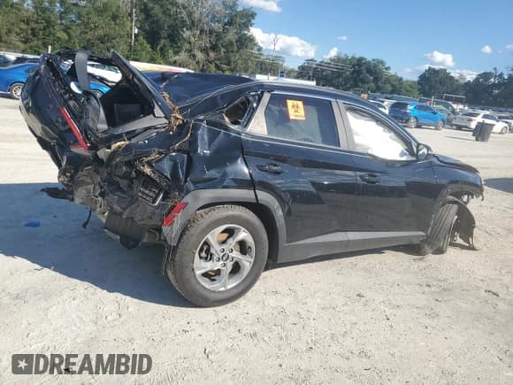 ✅ 2022 Hyundai Tucson SEL • VIN: 5NMJB3AE3NH021054 • Лот: 86694125. Опубликован ранее на Copart с пробегом 74 345 миль. Бесплатный доступ к архиву аукционных продаж из США и подробный отчёт об истории автомобиля на DreamBid. Изображение 3.