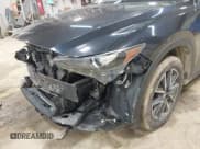 ✅ 2018 Mazda CX-5 Touring • VIN: JM3KFBCM2J0380100 • Lot: 43777906. Wystawiony na IAAI z przebiegiem 108 960 mil. Bezpłatny archiwum sprzedaży aukcyjnych z USA i szczegółowy raport historii pojazdu na DreamBid. Zdjęcie 18.