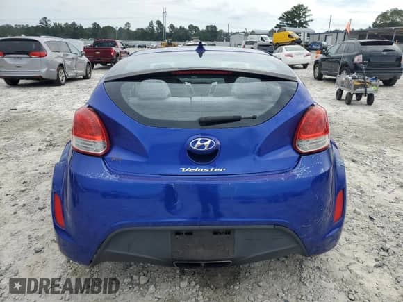 2012 Hyundai Veloster w/Gray Int с VIN KMHTC6AD8CU037430, выставлен на аукционе Copart как лот 69676955 с пробегом 115 290 миль миль и Списание • Salvage title. История ставок и продаж доступна на DreamBid. Изображение 6.