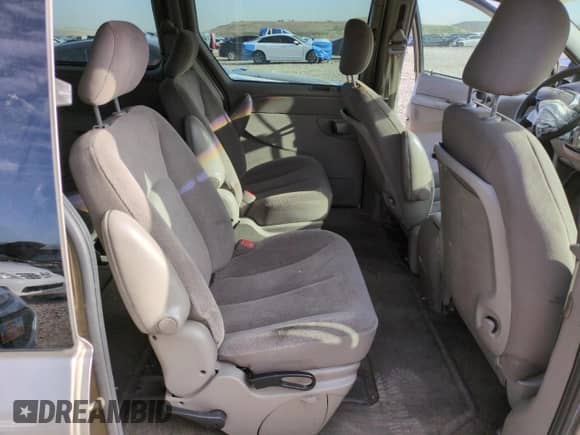 2002 Dodge Caravan EX с VIN 2B8GP74L92R661361, выставлен на аукционе Copart как лот 52313355 с пробегом Не указан миль и Списание • Salvage title. История ставок и продаж доступна на DreamBid. Изображение 12.