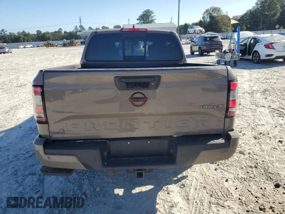 2022 Nissan Frontier Pro-X с VIN 1N6ED1EJ5NN633604, выставлен на аукционе Copart как лот 85081715 с пробегом 91 838 миль миль и Списание • Salvage title. История ставок и продаж доступна на DreamBid. Изображение 6.