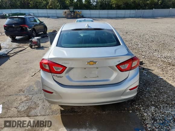 ✅ 2018 Chevrolet Cruze LT • VIN: 1G1BE5SM0J7217640 • Лот: 82124305. Опубликован ранее на Copart с пробегом 20 864 миль. Бесплатный доступ к архиву аукционных продаж из США и подробный отчёт об истории автомобиля на DreamBid. Изображение 6.