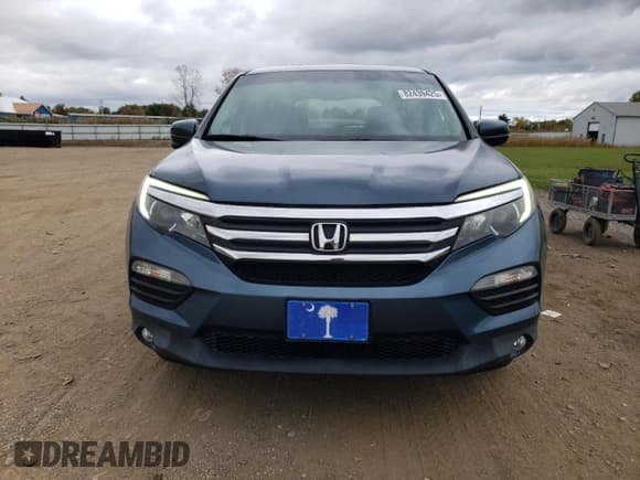 ✅ 2017 Honda Pilot EX-L • VIN: 5FNYF6H72HB023699 • Lot: 82439425. Listed on Copart with 63,725 mi. Free auction sales archive from the USA and detailed vehicle history report at DreamBid. Image 5.