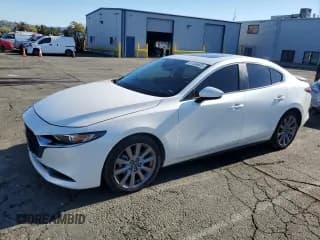 ✅ 2021 Mazda 3 Preferred • VIN: 3MZBPBCL8MM252861 • Лот: 87306605. Опубликован ранее на Copart с пробегом 61 001 миль. Бесплатный доступ к архиву аукционных продаж из США и подробный отчёт об истории автомобиля на DreamBid. Изображение 1.