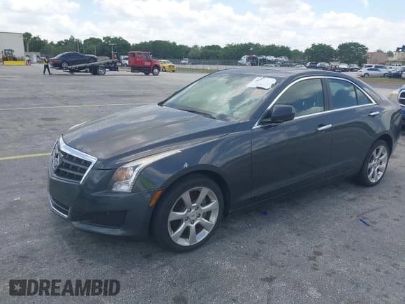 ✅ 2014 Cadillac ATS Standard AWD • VIN: 1G6AG5RX9E0173779 • Lot: 42172080. Listed on IAAI with 102,293 mi. Free auction sales archive from the USA and detailed vehicle history report at DreamBid. Image 2.
