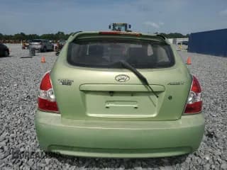 ✅ 2010 Hyundai Accent GS • VIN: KMHCM3AC0AU161031 • Лот: 63187505. Опубликован ранее на Copart с пробегом 128 460 миль. Бесплатный доступ к архиву аукционных продаж из США и подробный отчёт об истории автомобиля на DreamBid. Изображение 6.