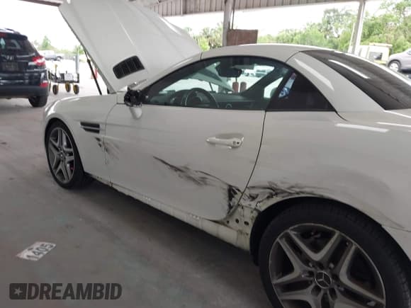 ✅ 2013 Mercedes-Benz SLK 250 • VIN: WDDPK4HA2DF058309 • Lot: 42417406. Listed on IAAI with 87,282 mi. Free auction sales archive from the USA and detailed vehicle history report at DreamBid. Image 6.