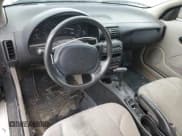 ✅ 1997 Saturn SC • VIN: 1G8ZF1282VZ133256 • Лот: 74026354. Опубликован ранее на Copart с пробегом 84 564 миль. Бесплатный доступ к архиву аукционных продаж из США и подробный отчёт об истории автомобиля на DreamBid. Изображение 8.