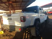 ✅ 2021 Jeep Gladiator Sport S • VIN: 1C6JJTAG8ML557863 • Lot: 43447555. Listed on IAAI with 24,365 mi. Free auction sales archive from the USA and detailed vehicle history report at DreamBid. Image 4.