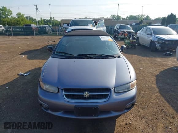 ✅ 1997 Chrysler Sebring JXi • VIN: 3C3EL55H8VT516002 • Lot: 42537777. Listed on IAAI with Not provided. Free auction sales archive from the USA and detailed vehicle history report at DreamBid. Image 12.