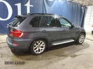 ✅ 2012 BMW X5 35i • VIN: 5UXZV4C59CL744933 • Lot: 92093165. Listed on Copart with 132,018 mi. Free auction sales archive from the USA and detailed vehicle history report at DreamBid. Image 3.