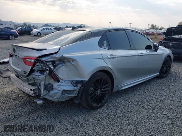 2022 Toyota Camry XSE z VIN 4T1K61BK3NU059339, wystawiony jako IAAI lot #43074738 z przebiegiem 34 765 mil mil oraz . Historia ofert i sprzedaży dostępna na DreamBid. Obrazek 4.