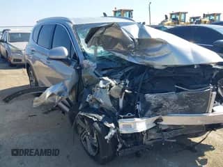 2021 Hyundai Santa Fe SEL z VIN 5NMS24AJ7MH307785, wystawiony jako IAAI lot #43155163 z przebiegiem 69 928 mil mil oraz . Historia ofert i sprzedaży dostępna na DreamBid. Obrazek 1.