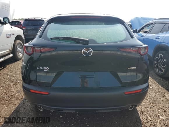 ✅ 2025 Mazda CX-30 S • VIN: 3MVDMBAMXSM826081 • Лот: 69024395. Опубликован ранее на Copart с пробегом Не указан. Бесплатный доступ к архиву аукционных продаж из США и подробный отчёт об истории автомобиля на DreamBid. Изображение 6.