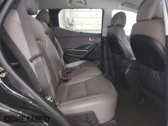 2017 Hyundai Santa Fe 2.0T z VIN 5XYZUDLA2HG435261, wystawiony jako Copart lot #68190485 z przebiegiem 125 513 mil mil oraz Szkoda całkowita • Salvage title. Historia ofert i sprzedaży dostępna na DreamBid. Obrazek 11.